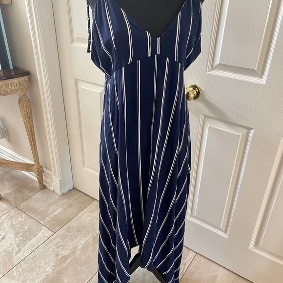 Beautiful navy dress with stripes by Elan.. Adjustable straps - Picture 1 of 7